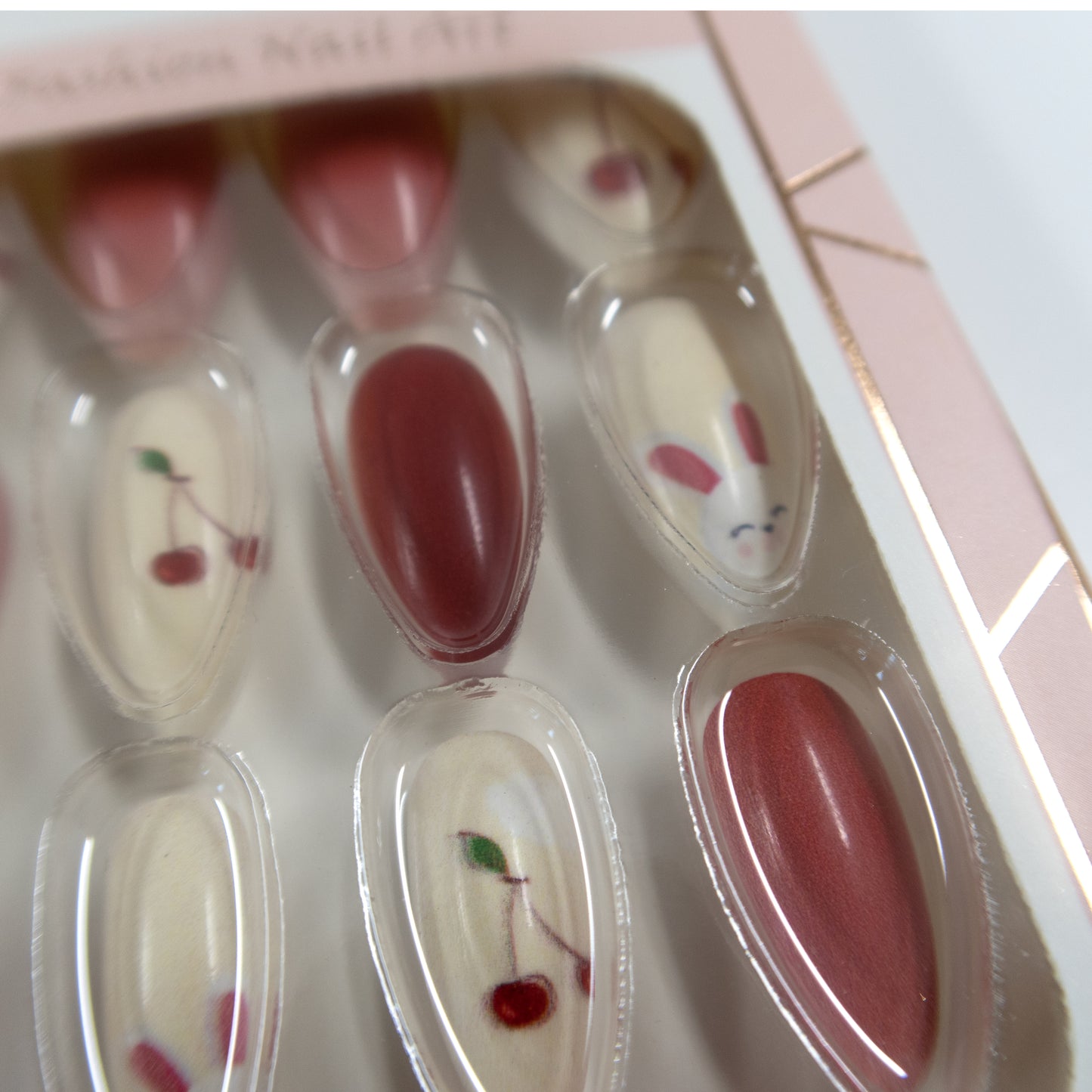 MULTI DESIGN ALMOND FAKE NAIL SET SS1112-40 (12PC)