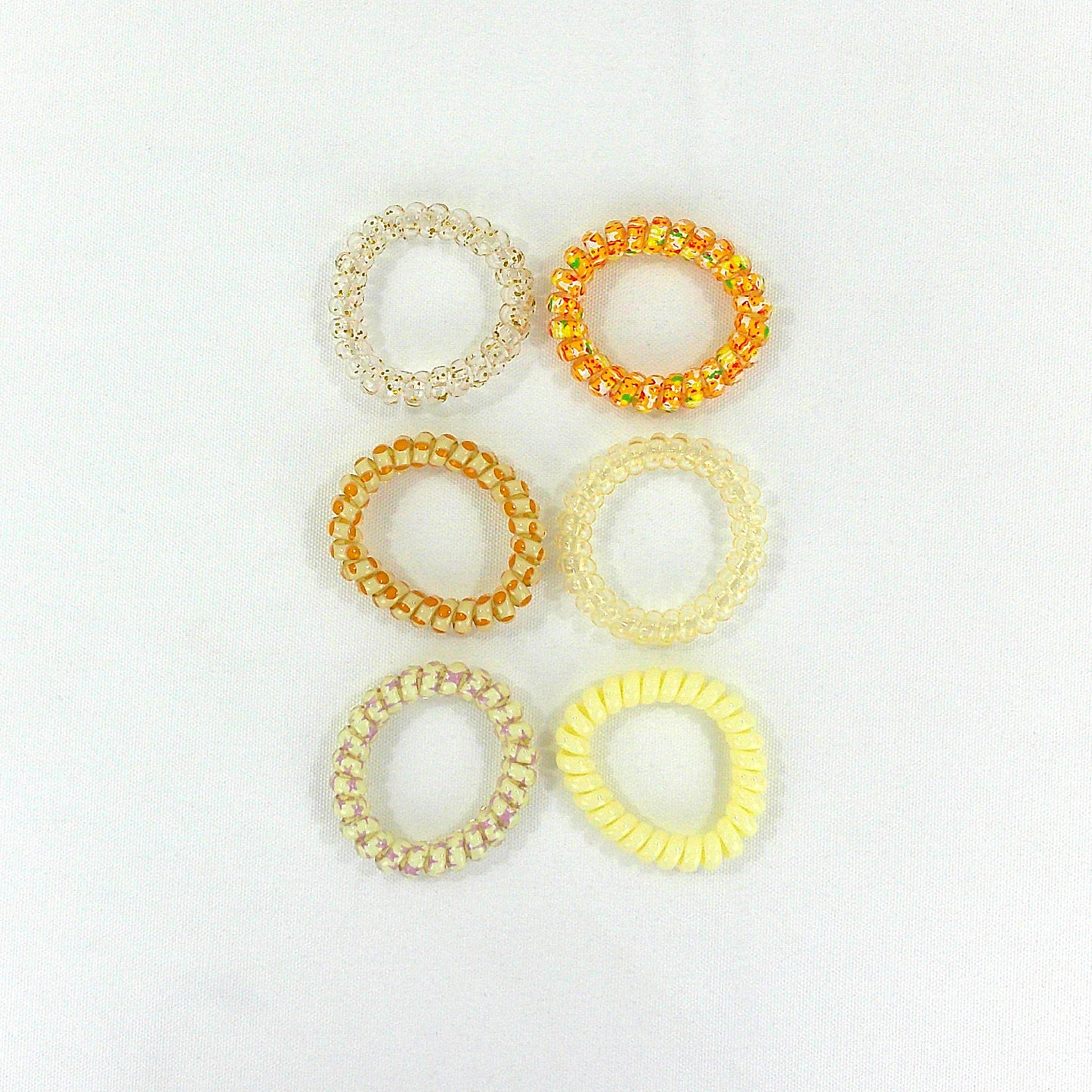 ELASTIC SPIRAL CLEAR HAIR TIE 6PCS IN PER CASE RB4222 (12PC)